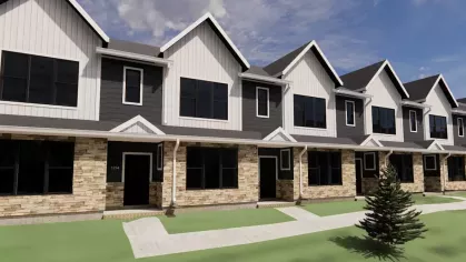 Side view rendering of the apartment community featuring a row of modern townhomes with landscaped green spaces and trees.