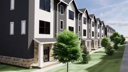 Architectural rendering of the Argenta Townhomes exterior showing the modern farmhouse style with dark siding, white accents, and stone veneer bases.